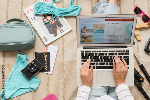 Female travel blogger with ...