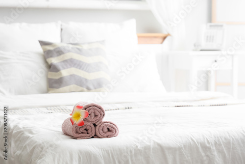 Rolled clean towels with pi...