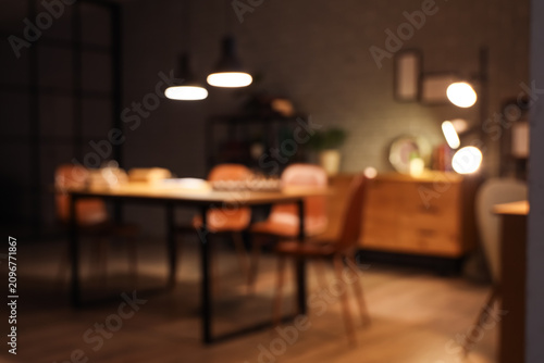 Blurred view of dark room w...
