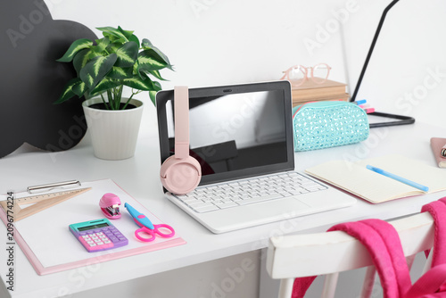 Workspace with school suppl...