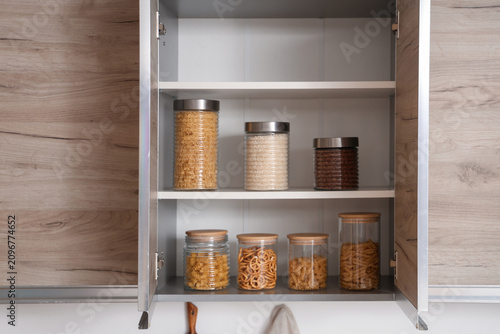 Glass jars with different p...