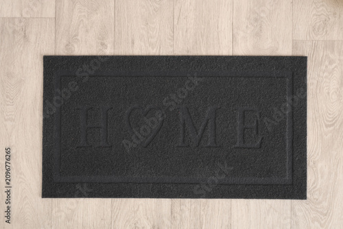 Door mat on floor in hallwa...