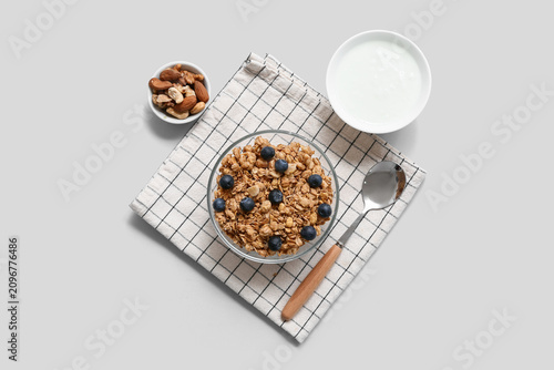 Napkin, bowl with tasty gra...
