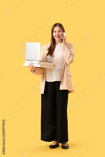Young pregnant businesswoma...