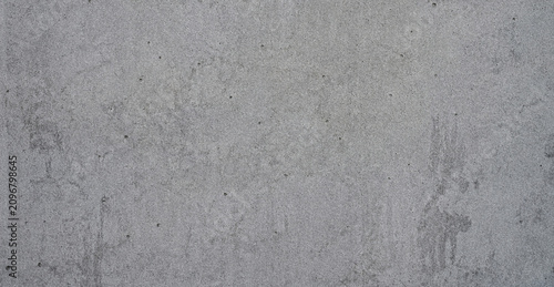 Foto A close-up image of a textured gray concrete wall with a rough surface