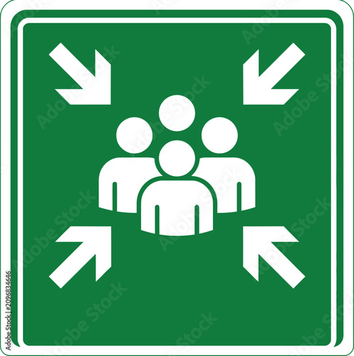 Green emergency assembly point sign with white human icons and directional arrows on square background