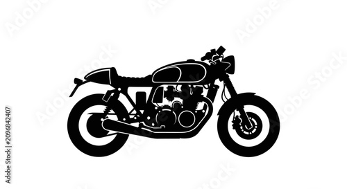 Photos Motorcycle silhouette captures the classic style of a vintage cafe racer vehicle in profile