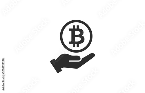 Black bitcoin symbol icon held in a human hand representing cryptocurrency finance and digital investment