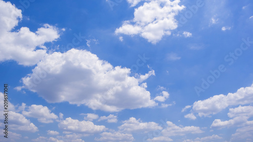 clear blue sky background,clouds with background, Blue sky background with tiny clouds. White fluffy clouds in the blue sky. 
Captivating stock photo featuring the mesmerizing beauty of the sky and cl