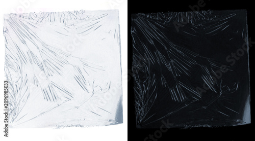 Schilderij op canvas Crumpled plastic wrap texture on black and white backgrounds, transparent cellop