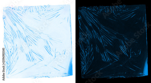 Obraz na płótnie Crumpled plastic wrap texture on white and black background, transparent celloph