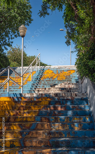 Fotografía Stairs painted in different colors, leading upwards