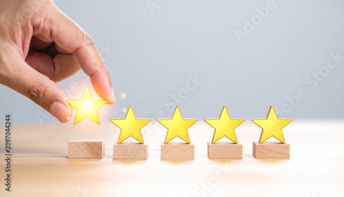 Hand placing glowing star symbolizing excellence and quality