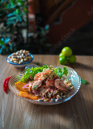 Traditional Peruvian ceviche made with fresh fish, lime juice, red onion, cilantro and chili, served as a classic dish of Peruvian cuisine in a traditional restaurant.