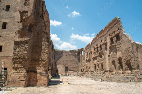 Part of the internal section with massive ancient brick walls and arches of the Baths of Caracalla in Rome, Italy