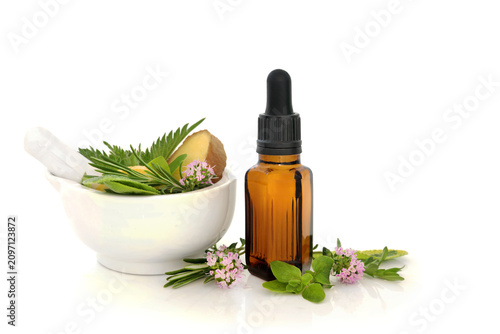 Obraz na płótnie Homemade medication for Summer hayfever sneezing, itching allergies with tincture bottle, mortar, ginger spice, thyme, sage, marjoram herbs