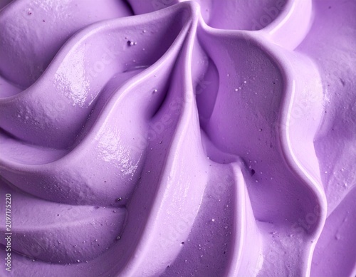 Macro close up of smooth violet gelato cream with star shaped swirl and bright soft lighting