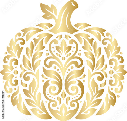 Golden decorative pumpkin with intricate floral filigree and damask pattern