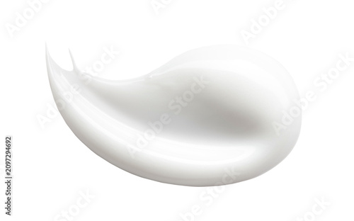 Obraz na płótnie Close-up photo of a smear of creamy lotion on a white background