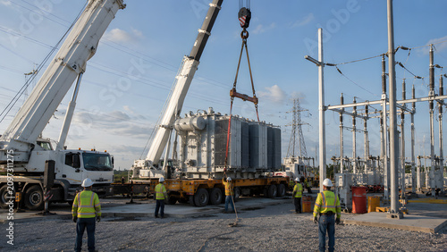 Crane Installing High Voltage Power Transformer