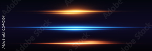 Bild auf Leinwand Light flares illuminating dark background with dynamic blue and orange glowing l