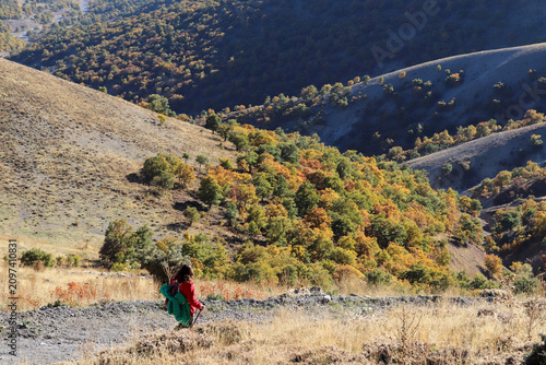 mountaineer walking along the winding path