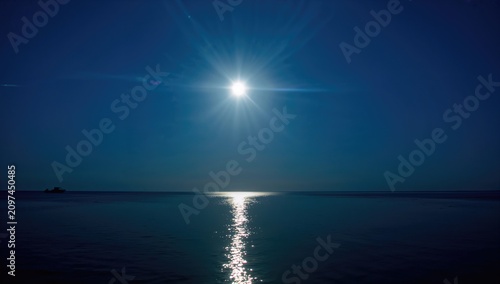 Bright Sun Over Calm Ocean ...