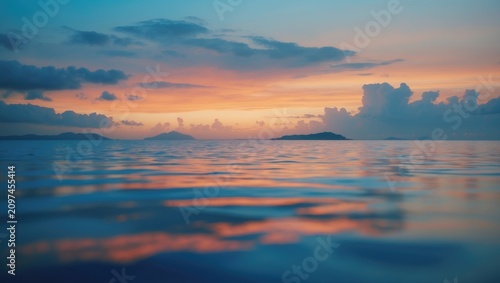Sunset sky with warm hues o...