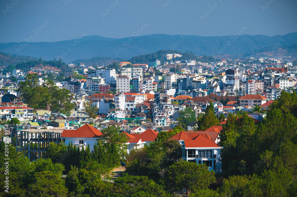 Fototapeta premium aerial view of Dalat city with Vietnamese houses and hotels in Vietnam in Asia