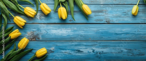 Yellow tulips arranged on a...