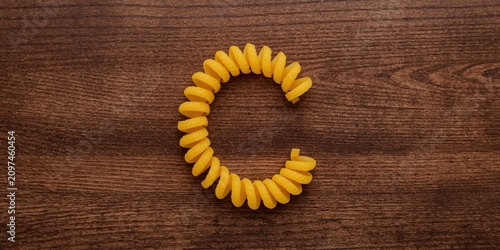 Yellow Pasta Shaped Like Le...
