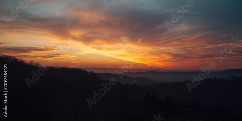 Dramatic Sunset Over Mounta...
