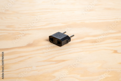 Quadro su tela European two prong travel adapter plug on wooden table