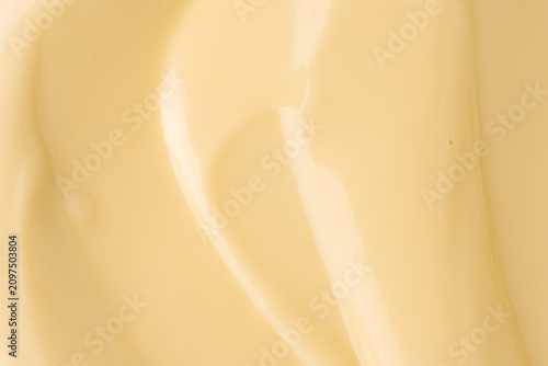 Bild auf Leinwand Smooth Light Yellow Cream Texture with Silky Glossy Waves Abstract Backdrop