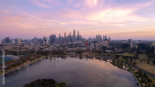 Sunrise view of Yarra river and Melbourne skyscrapers business office building with evening skyline in Victoria, Australia