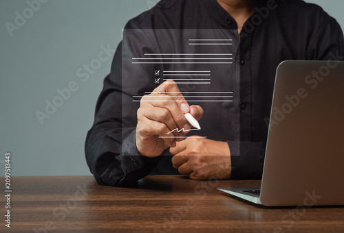Person signing digital document on virtual interface