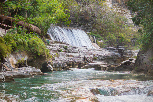 Amazingly, in East Sumba which has a long dry season and hard, rocky, coral-like soil—there are still waterfalls, cutting through the stone mountains and absolutely beautiful