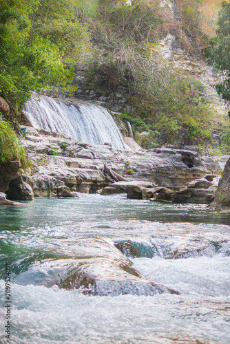Amazingly, in East Sumba which has a long dry season and hard, rocky, coral-like soil—there are still waterfalls, cutting through the stone mountains and absolutely beautiful