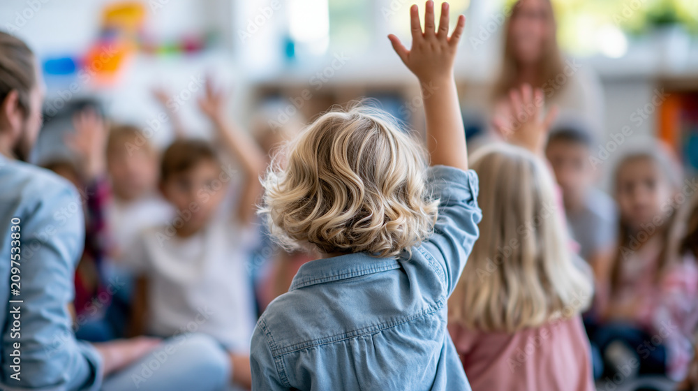 Fototapeta premium Faceless elementary school teacher sitting on class floor with little pupils and moving hands up in interactive group activity, playful teaching concept, school photography,