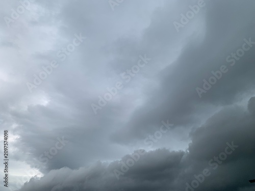 A natural view of a sky with dark rain clouds before it rains.