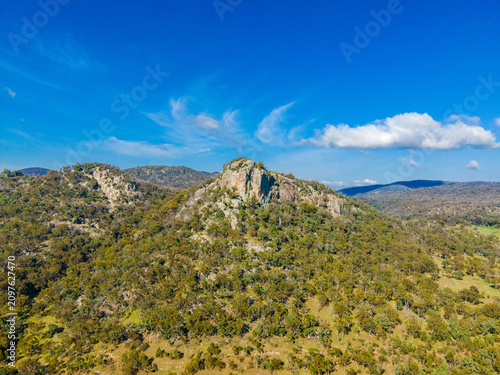 Aerial View at Bluff Rock with big beautiful green mountains and blue sky in Australia