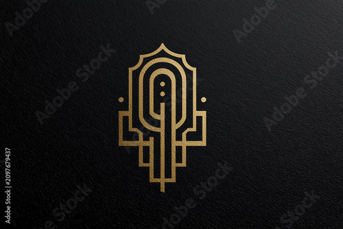 Elegant gold deco emblem on black background