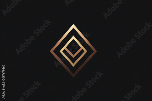 Luxury gold diamond emblem with letter on black background