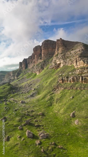 Aerial view of a mountain plateau with high cliffs. Landscape and nature of the North Caucasus.
