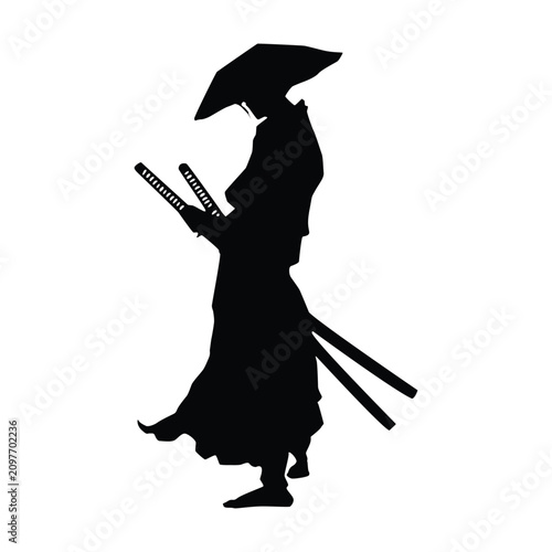 Samurai stands in a traditional pose wearing a straw hat while holding two sharp katana swords ready.