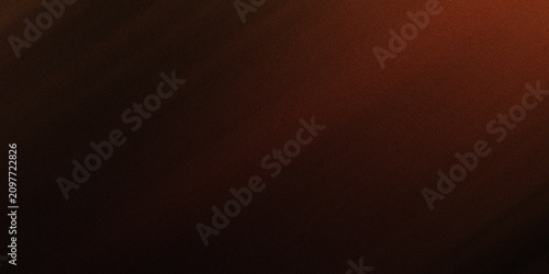Fotografía Abstract dark background featuring soft orange light diffusion and grainy film texture