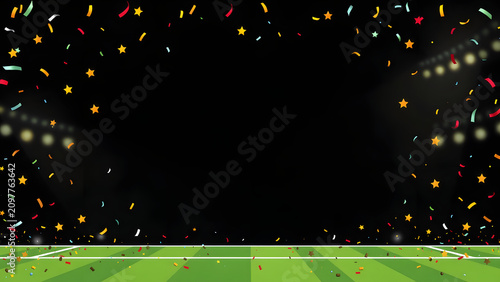 Textured green sports field with white lines and falling multi-colored confetti and gold stars under bright stadium lights on a dark background.