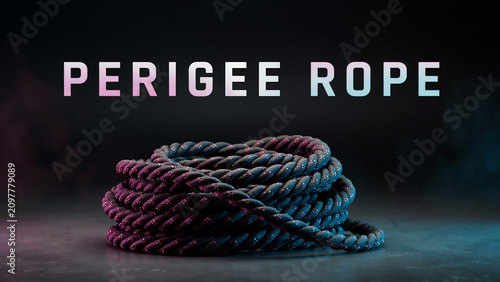 Coiled rope with pink and blue hues on a dark surface with text reading perigee rope