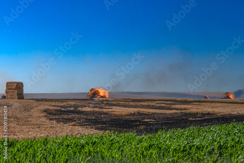 Distant crop fires visible on horizon, agricultural smoke pollution