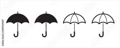 Tableau sur toile Four Different Black and White Umbrella Icons on White Background